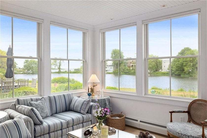 Perched at the water's edge, 19 Teal Drive is a custom-built - photo 19