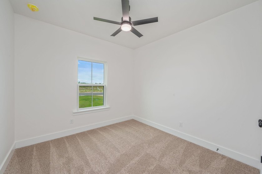 Welcome home to this beautiful new construction 4-bedroom - photo 34