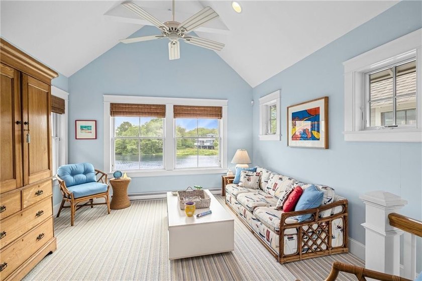 Perched at the water's edge, 19 Teal Drive is a custom-built - photo 39