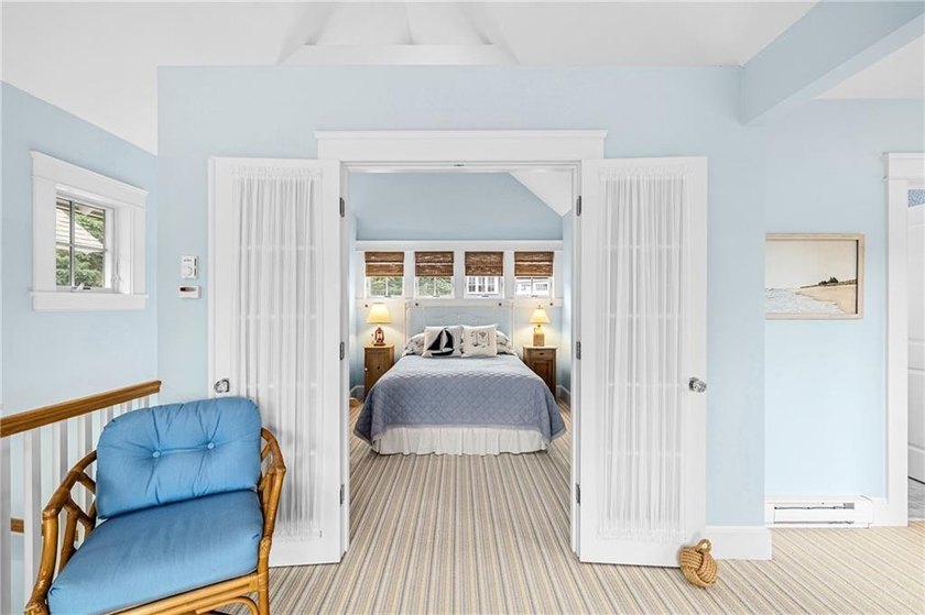 Perched at the water's edge, 19 Teal Drive is a custom-built - photo 41