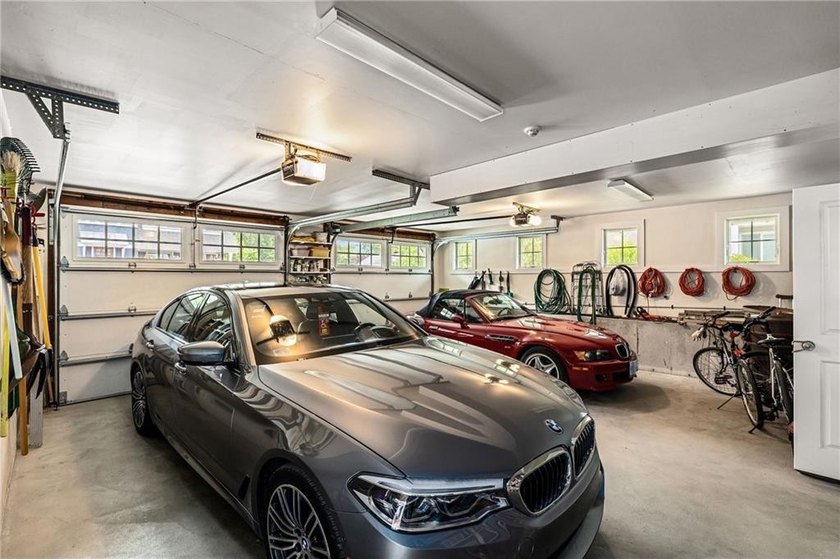 Perched at the water's edge, 19 Teal Drive is a custom-built - photo 45