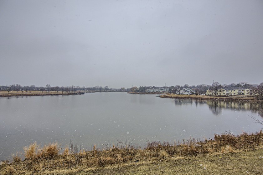 Enjoy serene water views from your private balcony in this 2-bed - photo 10