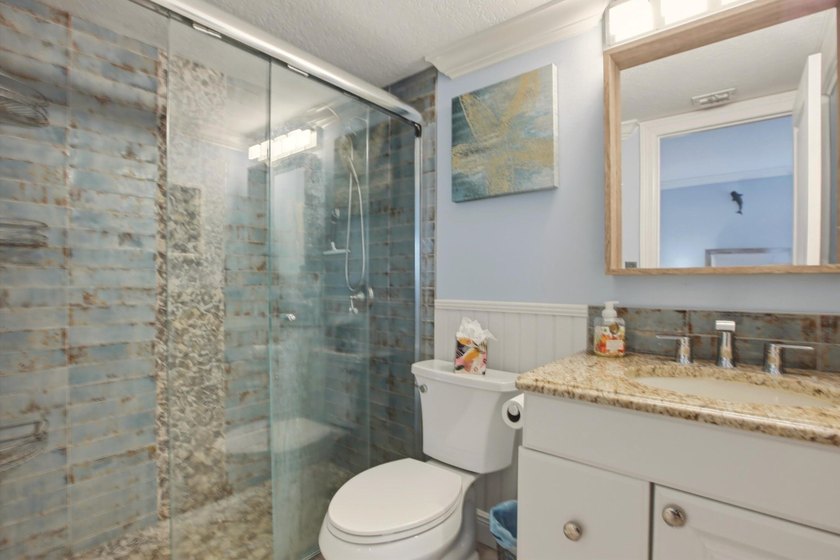 Make this beautifully updated and tastefully decorated 1-bedroom - photo 14
