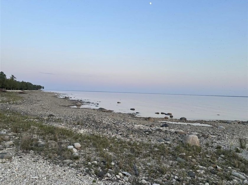Secluded 2.40acre lot and 424.40 of waterfront on Lake Huron - photo 13