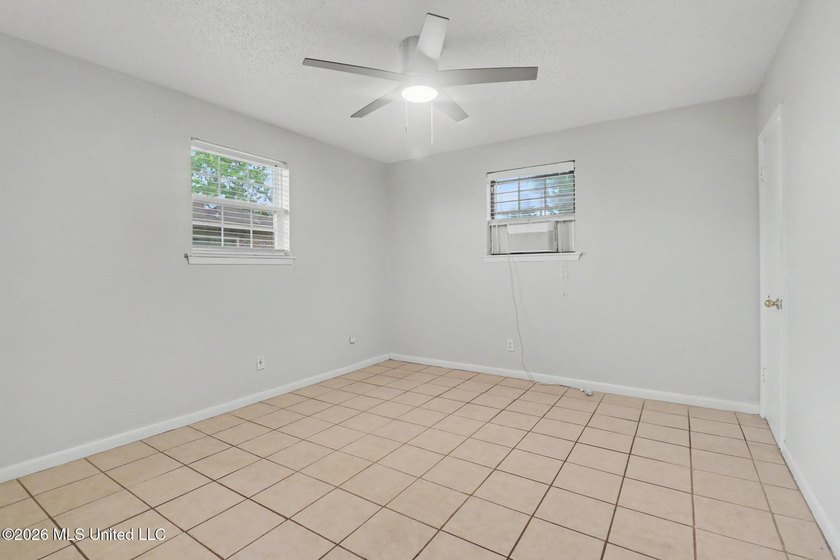 Welcome to this charming 3-bedroom, 2-bath brick home located in - photo 17