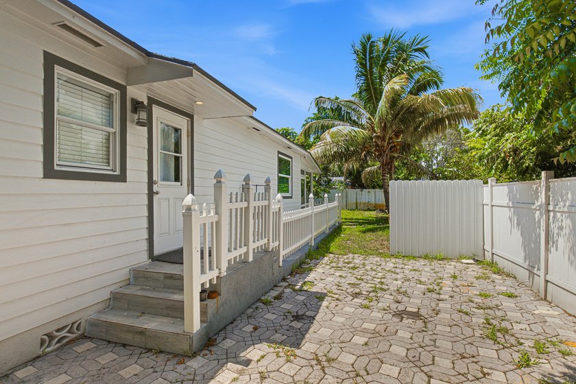 This charming single-family home, nestled in the heart of West - photo 24