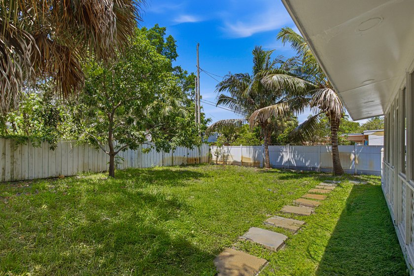 This charming single-family home, nestled in the heart of West - photo 29