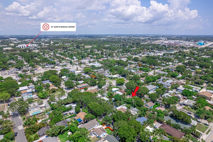 This charming single-family home, nestled in the heart of West - photo 33