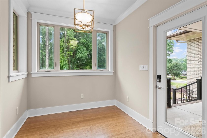This exceptional custom-built luxury home, originally crafted as - photo 12