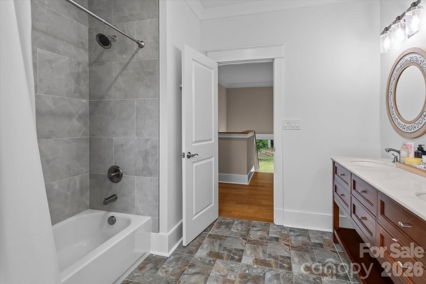 This exceptional custom-built luxury home, originally crafted as - photo 33