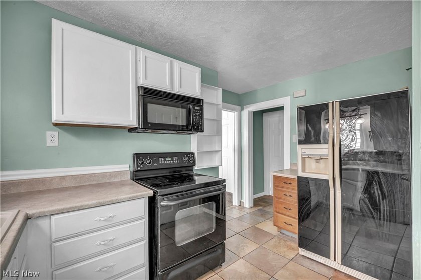 Welcome home to this charming and beautifully updated three - photo 14