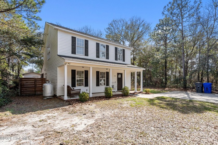 Beautifully Renovated Two-Story Home in a Quiet, Wooded Section - photo 3
