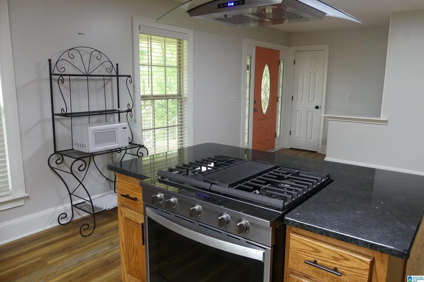 This is a spacious home with 13.55 acres with unlimited rental - photo 10