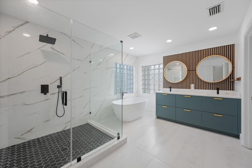 Wow! 180K in upgrades on this beautiful 4-bedroom, 3-bath home - photo 3