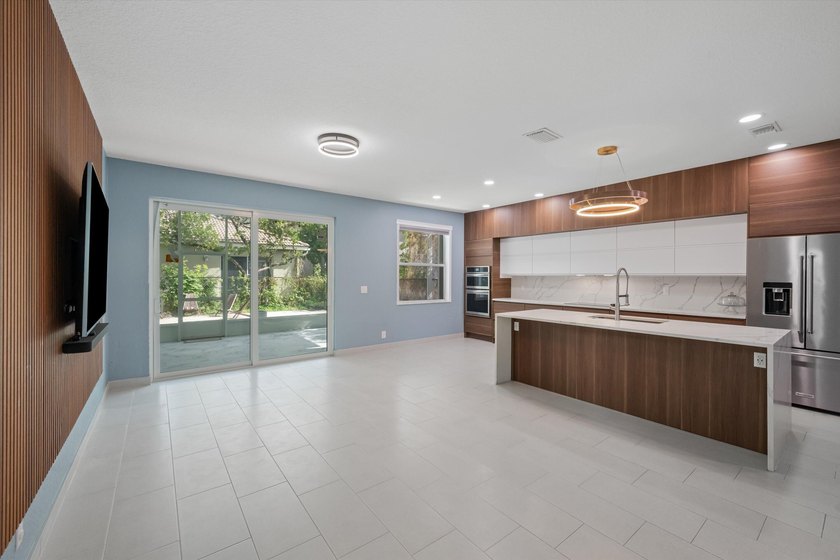 Wow! 180K in upgrades on this beautiful 4-bedroom, 3-bath home - photo 4