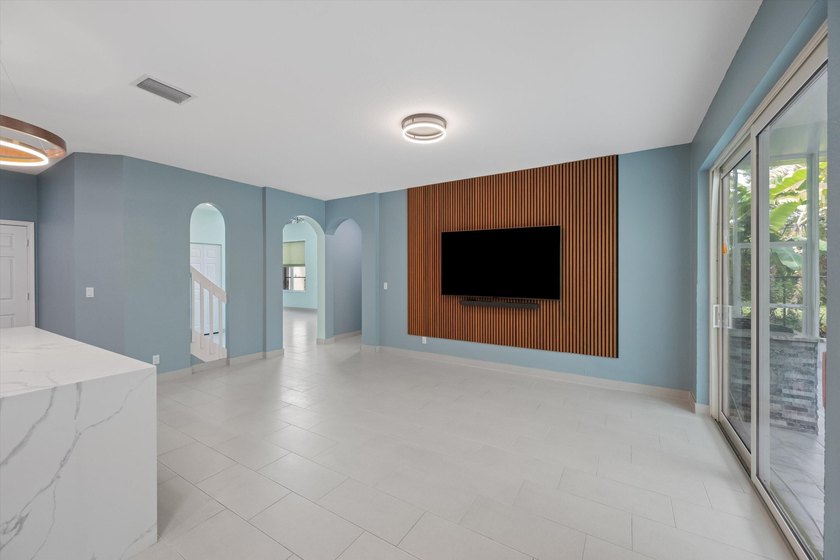 Wow! 180K in upgrades on this beautiful 4-bedroom, 3-bath home - photo 10