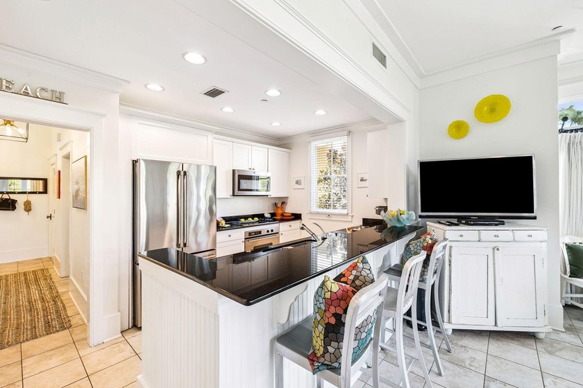The only beachside one-bedroom, two-bath residence in - photo 13