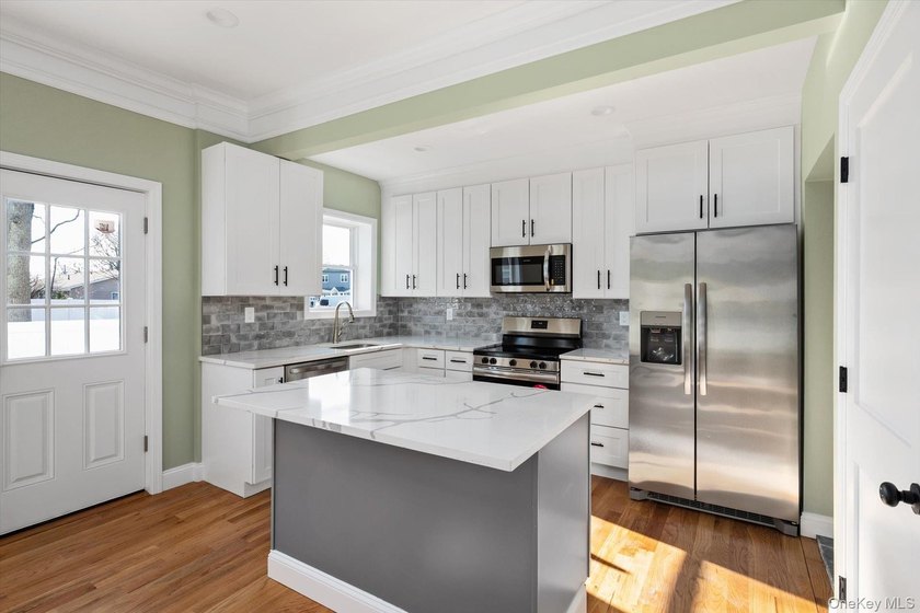 This completely remodeled home comes complete with modern - photo 11