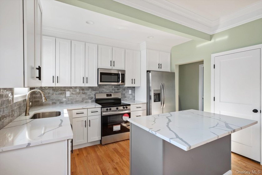 This completely remodeled home comes complete with modern - photo 12