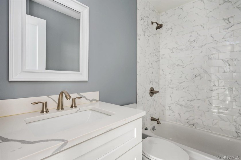 This completely remodeled home comes complete with modern - photo 16