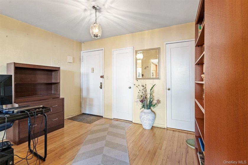 Sophisticated and sun-filled two-bedroom co-op offering hardwood - photo 2