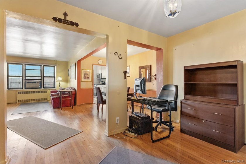 Sophisticated and sun-filled two-bedroom co-op offering hardwood - photo 8