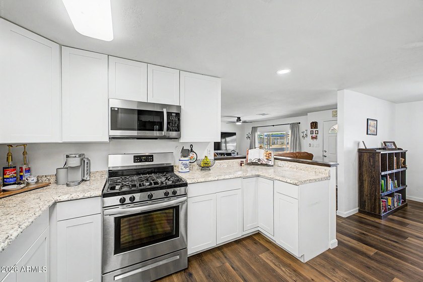 Pride of ownership shines with this beautifully renovated home! - photo 7