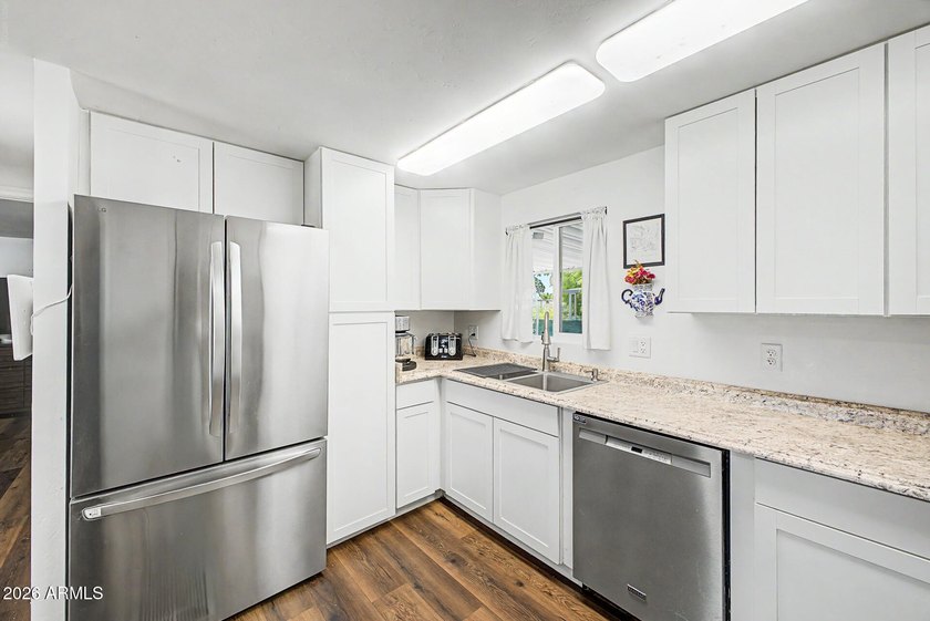 Pride of ownership shines with this beautifully renovated home! - photo 9