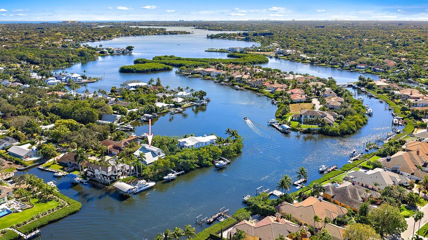 This gorgeous riverfront home boasts 100 feet of water frontage - photo 2