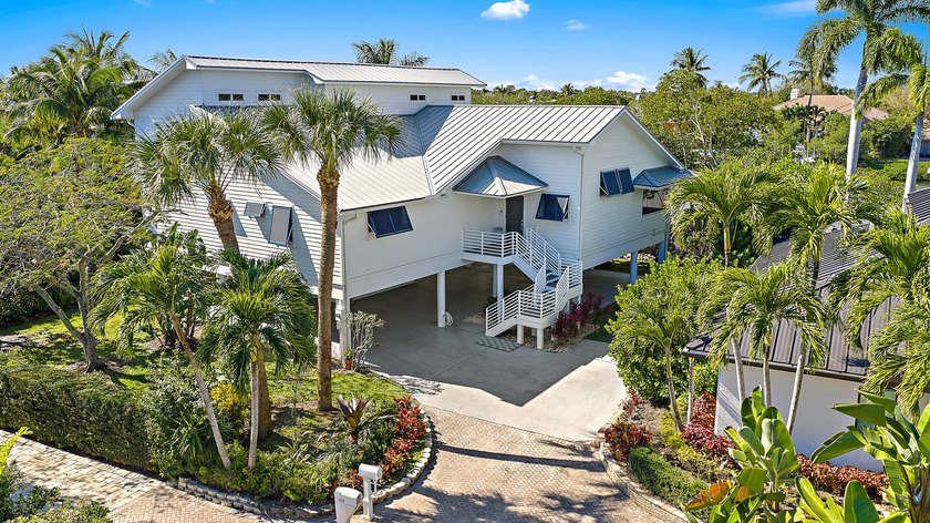 This gorgeous riverfront home boasts 100 feet of water frontage - photo 5
