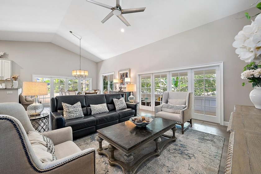 This gorgeous riverfront home boasts 100 feet of water frontage - photo 6