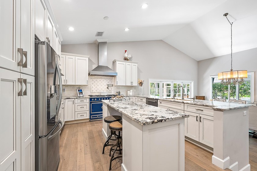 This gorgeous riverfront home boasts 100 feet of water frontage - photo 7