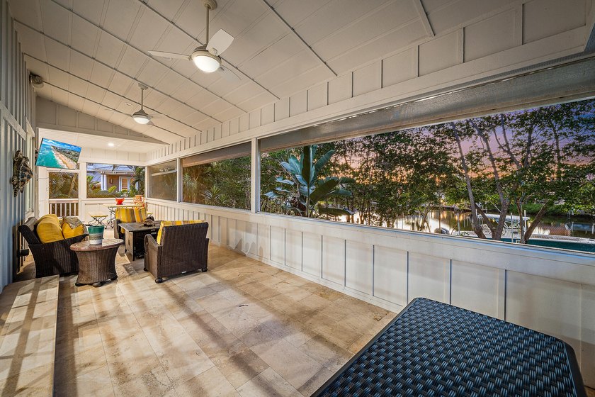 This gorgeous riverfront home boasts 100 feet of water frontage - photo 8