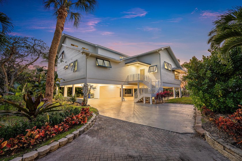 This gorgeous riverfront home boasts 100 feet of water frontage - photo 10