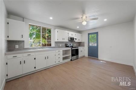 7.29-acre ranch featuring three distinct residential units. This - photo 4