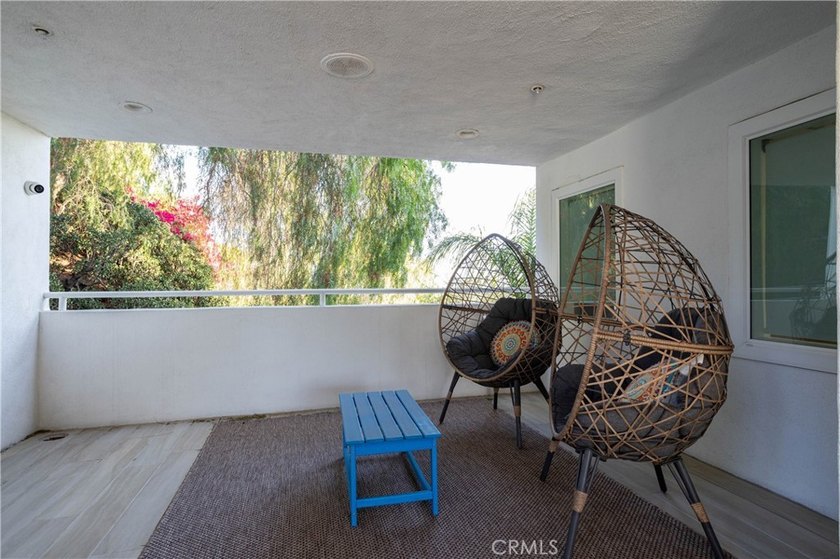 Perched in the hills of Panorama Heights in North Tustin, this - photo 4
