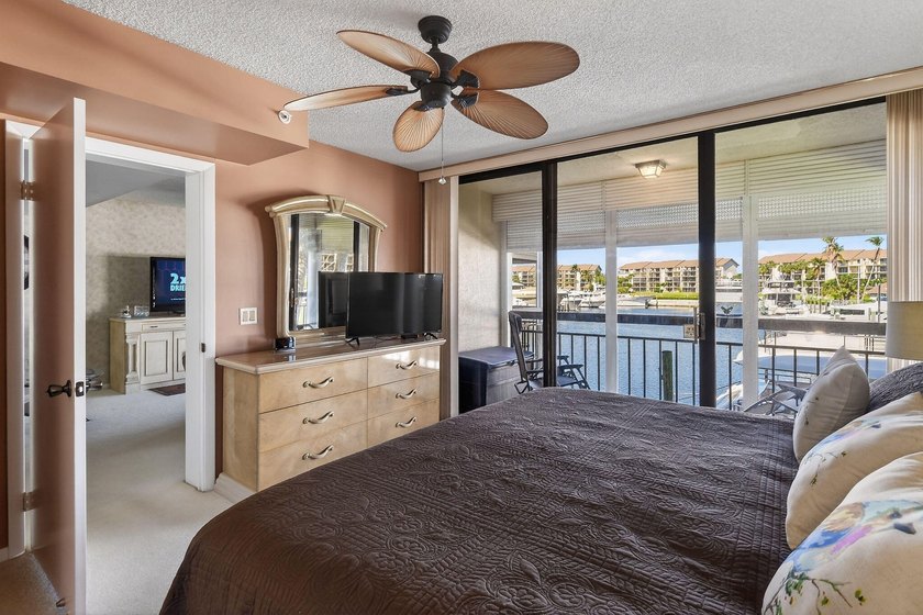Enjoy spectacular marina views from your living room, kitchen - photo 12