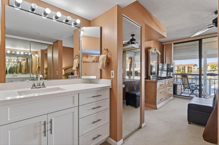 Enjoy spectacular marina views from your living room, kitchen - photo 14