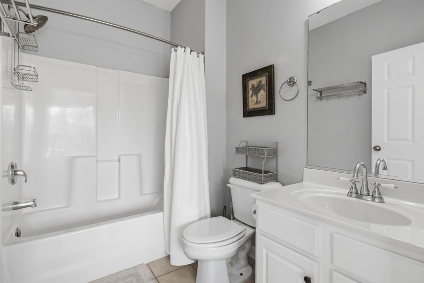 Beautiful and updated light bright third floor end unit in one - photo 21