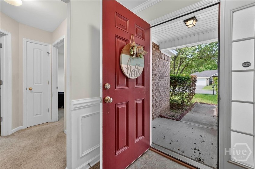 Welcome to this beautifully maintained 3-bedroom, 2-bath home - photo 2