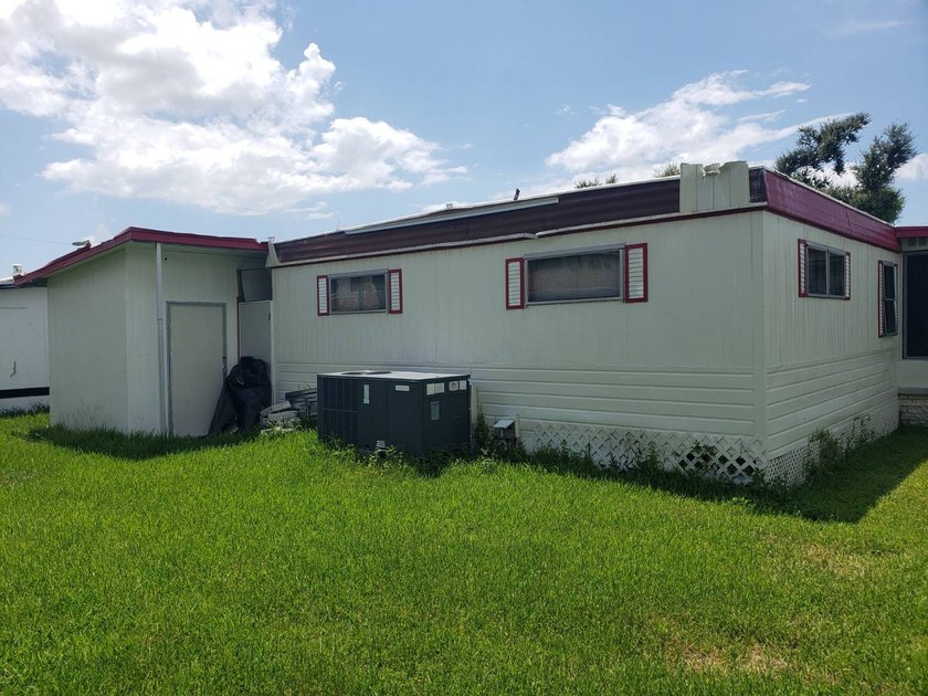 Lots of potential with this 2 bedroom doublewide. Home has - photo 2