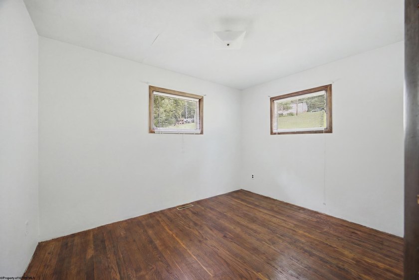 This charming 3-bedroom, 1-bath home is ideally located just - photo 12