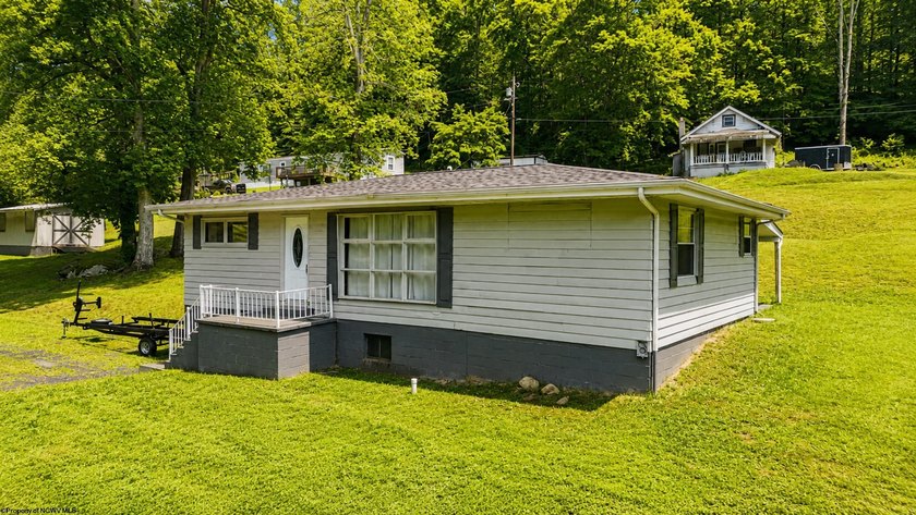 This charming 3-bedroom, 1-bath home is ideally located just - photo 23