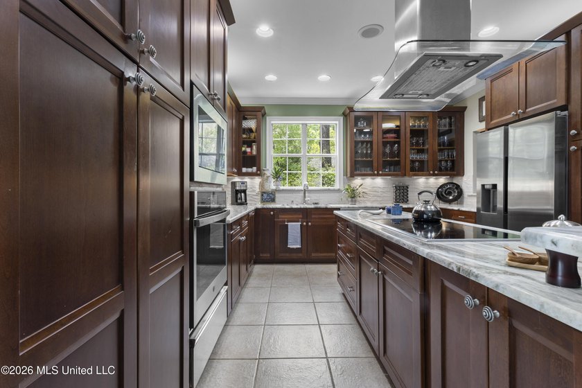 Stunning Bayou View Beauty with Custom Features &amp; Entertainer's - photo 19