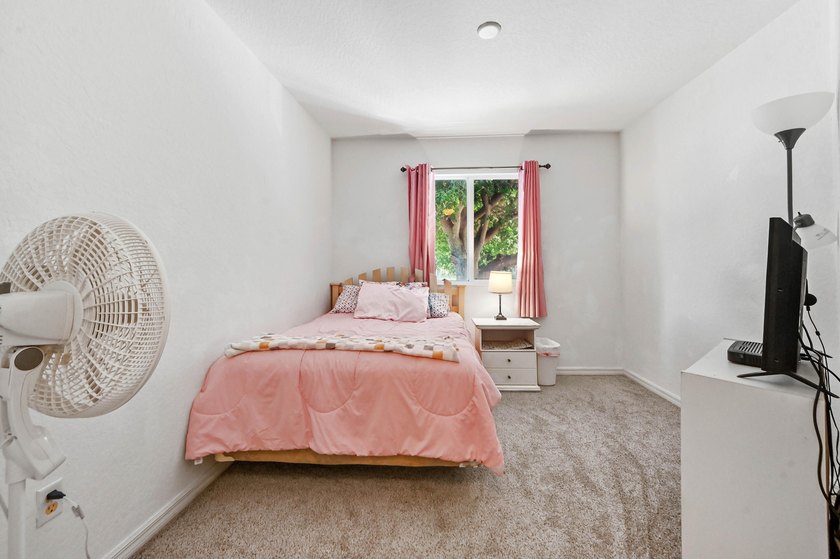 Welcome to this charming 3-bedroom, 2.5-bathroom townhouse - photo 19