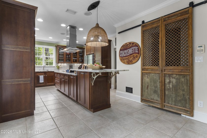 Stunning Bayou View Beauty with Custom Features &amp; Entertainer's - photo 25