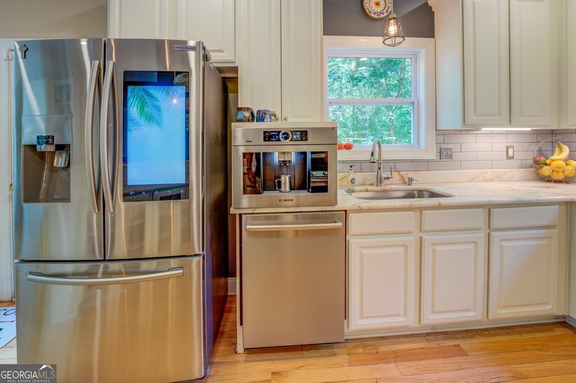 New Price on Custom Elevated Lakefront Home with Carriage House - photo 26