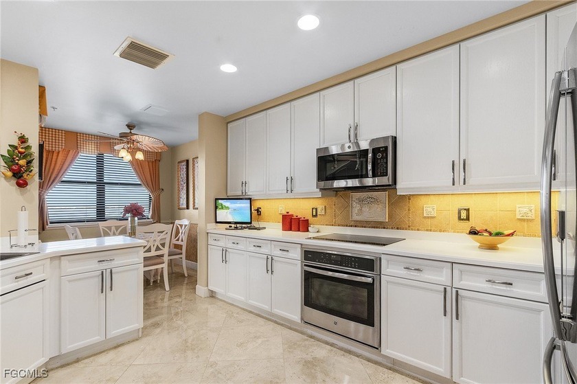 Welcome to 11620 Court Of Palms Unit 501, an exquisite residence - photo 11