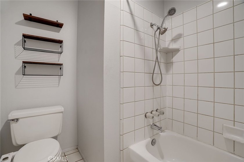 Experience true coastal living in this beautiful two-bedroom - photo 18