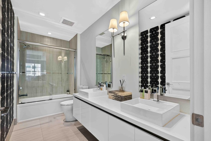 Step into the epitome of modern luxury with Unit 611 at Tower - photo 35